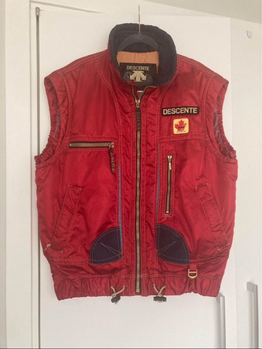 Descente Red Men's Quilted Travel Vest with Navy Accents
